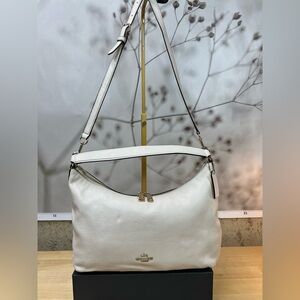 Coach Celeste Polished Pebble Leather. Color: Chalk (off-white)